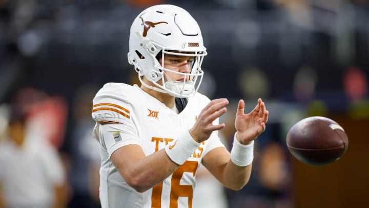 Dec 2, 2023; Arlington, TX, USA; Texas Longhorns quarterback Arch Manning (16) warms up prior to the game against the Oklahoma State Cowboys at AT&T Stadium.