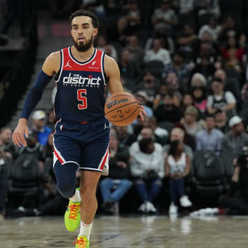Jan 29, 2024; San Antonio, Texas, USA;  Washington Wizards guard Tyus Jones (5) dribbles up the court in the second half against the San Antonio Spurs at Frost Bank Center. Mandatory Credit: Daniel Dunn-USA TODAY Sports