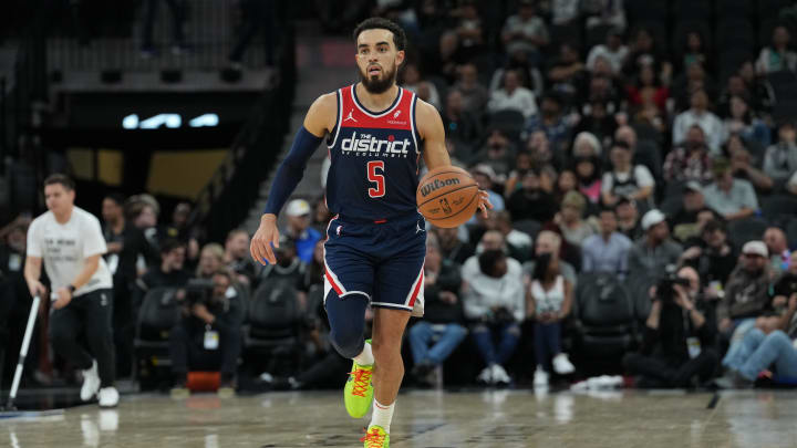 Jan 29, 2024; San Antonio, Texas, USA;  Washington Wizards guard Tyus Jones (5) dribbles up the court in the second half against the San Antonio Spurs at Frost Bank Center. Mandatory Credit: Daniel Dunn-USA TODAY Sports