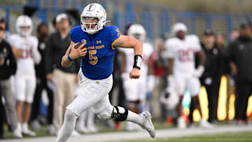 Nov 29, 2024; San Jose, California, USA; San Jose State Spartans quarterback Walker Eget (5) runs the ball against the Stanford Cardinal in the fourth quarter at CEFCU Stadium. Mandatory Credit: Eakin Howard-Imagn Images