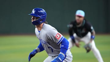 Jul 4, 2025; Phoenix, Arizona, USA; Kansas City Royals shortstop Bobby Witt Jr. (7) leads off first against the Arizona Diamondbacks during the first inning at Chase Field. Mandatory Credit: Joe Camporeale-Imagn Images