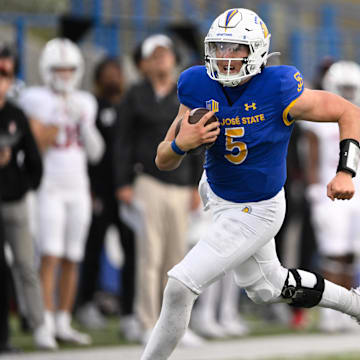 Nov 29, 2024; San Jose, California, USA; San Jose State Spartans quarterback Walker Eget (5) runs the ball against the Stanford Cardinal in the fourth quarter at CEFCU Stadium. Mandatory Credit: Eakin Howard-Imagn Images