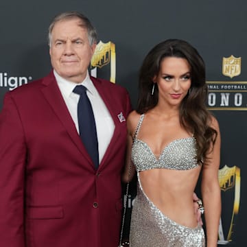 Bill Belichick and girlfriend Jordon Hudson on the red carpet before Super Bowl LIX NFL Honors.
