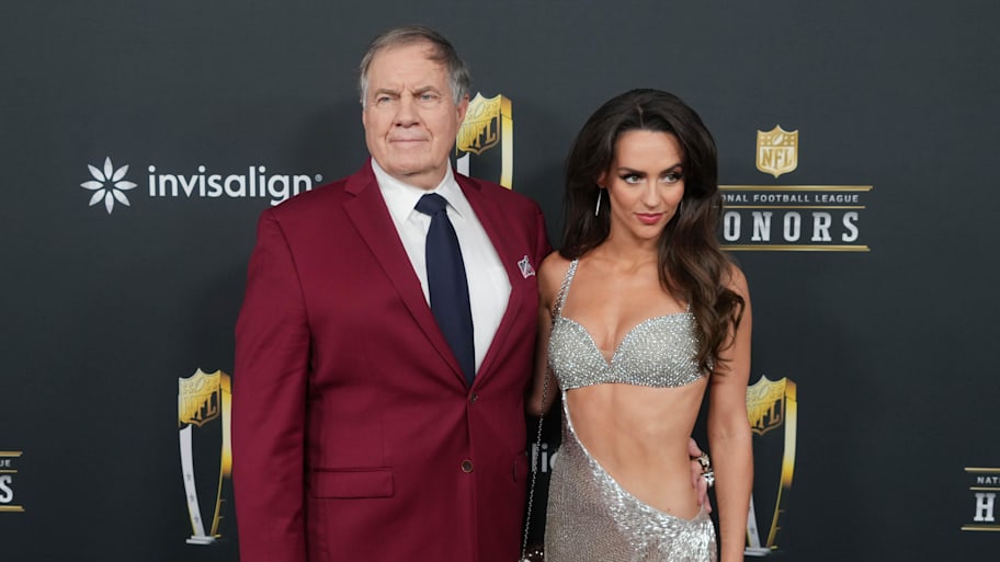 Bill Belichick and girlfriend Jordon Hudson on the red carpet before Super Bowl LIX NFL Honors. | Kirby Lee-Imagn Images