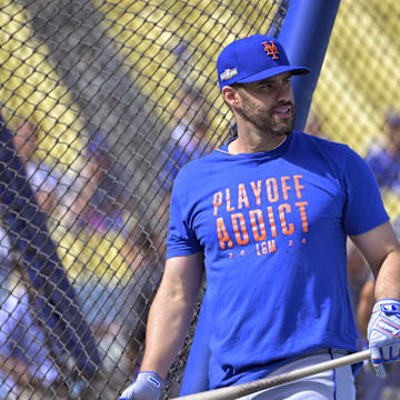 Oct 14, 2024; Los Angeles, California, USA; New York Mets designated hitter J.D. Martinez (28) warms up before game two against the Los Angeles Dodgers in the NLCS for the 2024 MLB Playoffs at Dodger Stadium. Mandatory Credit: Jayne Kamin-Oncea-Imagn Images
