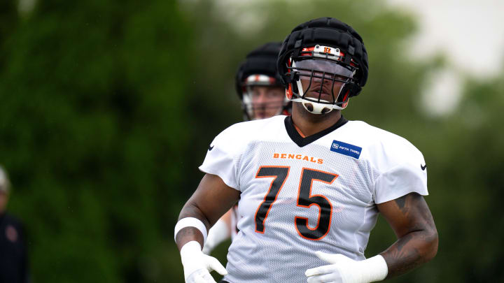 Cincinnati Bengals offensive tackle Orlando Brown Jr. (75) runs a drill at Cincinnati Bengals training camp on the Kettering Health Practice Fields in Cincinnati on Sunday, July 28, 2024.