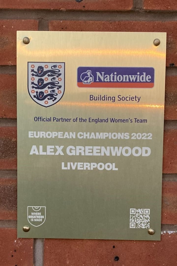 Alex Greenwood gold plaque