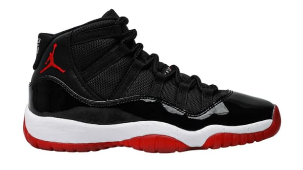 Black and red Air Jordan 11 sneakers.