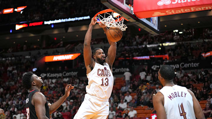 Mar 24, 2024; Miami, Florida, USA;  Cleveland Cavaliers center Tristan Thompson (13) gets a dunk against the Miami Heat during the second half at Kaseya Center. Mandatory Credit: Jim Rassol-Imagn Images