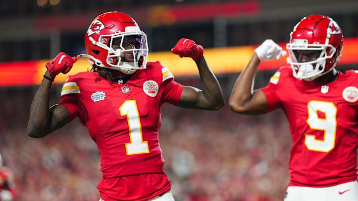 Sep 5, 2024; Kansas City, Missouri, USA; Kansas City Chiefs wide receiver Xavier Worthy (1) celebrates with wide receiver JuJu Smith-Schuster (9) after scoring a touchdown during the second half against the Baltimore Ravens at GEHA Field at Arrowhead Stadium. Mandatory Credit: Jay Biggerstaff-Imagn Images