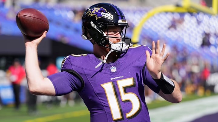 Oct 5, 2025; Baltimore, Maryland, USA; Baltimore Ravens quarterback Cooper Rush (15) warms up before a game against the Houston Texans at M&T Bank Stadium. Mandatory Credit: Mitch Stringer-Imagn Images