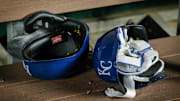 Apr 10, 2024; Kansas City, Missouri, USA; Kansas City Royals batting helmets in the dugout after the game against the Houston Astros at Kauffman Stadium. Mandatory Credit: William Purnell-Imagn Images