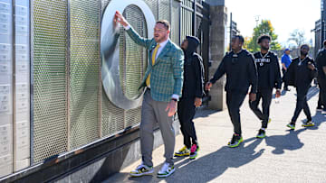 Oct 12, 2024; Eugene, Oregon, USA; Oregon Ducks head coach Dan Lanning touches the O during the walk-in before the game against the Ohio State Buckeyes at Autzen Stadium.