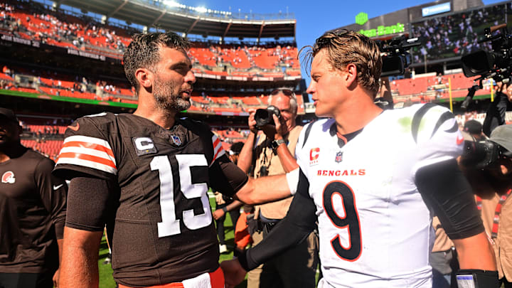 Sep 7, 2025; Cleveland, Ohio, USA; Cleveland Browns quarterback Joe Flacco (15) and Cincinnati Bengals quarterback Joe Burrow (9) shake hands after a game at Huntington Bank Field. Mandatory Credit: Ken Blaze-Imagn Images