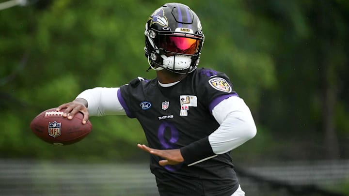 Jul 29, 2022; Owings Mills, MD, USA; Baltimore Ravens quarterback Lamar Jackson (8) practices at the Under Armour Performance Center. Mandatory Credit: Mitch Stringer-Imagn Images Jul 29, 2022; Owings Mills, MD, USA; Baltimore Ravens quarterback Lamar Jackson (8) practices at the Under Armour Performance Center. Mandatory Credit: Mitch Stringer-Imagn Images