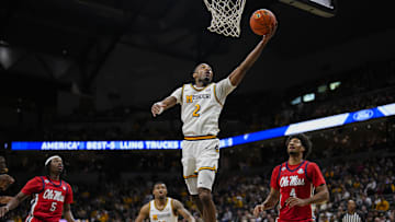 Jan 25, 2025; Columbia, Missouri, USA; Missouri Tigers guard Tamar Bates (2) shoots during the first half against the Mississippi Rebels at Mizzou Arena. Mandatory Credit: Jay Biggerstaff-Imagn Images
