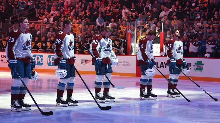 Mar 24, 2026; Pittsburgh, Pennsylvania, USA; The Colorado Avalanche starting line-up (L to R) center Nathan MacKinnon (29), center Martin Necas (88), left wing Gabriel Landeskog (92), defenseman Cale Makar (8) and defenseman Brett Kulak (27) stand for the national anthem against the Pittsburgh Penguins at PPG Paints Arena. Mandatory Credit: Charles LeClaire-Imagn Images Mar 24, 2026; Pittsburgh, Pennsylvania, USA; The Colorado Avalanche starting line-up (L to R) center Nathan MacKinnon (29), center Martin Necas (88), left wing Gabriel Landeskog (92), defenseman Cale Makar (8) and defenseman Brett Kulak (27) stand for the national anthem against the Pittsburgh Penguins at PPG Paints Arena. Mandatory Credit: Charles LeClaire-Imagn Images