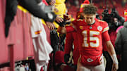 Jan 18, 2025; Kansas City, Missouri, USA; Kansas City Chiefs quarterback Patrick Mahomes (15) shakes hands with fans after defeating the Houston Texans in a 2025 AFC divisional round game at GEHA Field at Arrowhead Stadium. Mandatory Credit: Jay Biggerstaff-Imagn Images