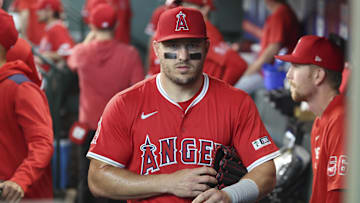 Apr 12, 2025; Houston, Texas, USA; Los Angeles Angels right fielder Mike Trout (27) walks in the dugout before the game against the Houston Astros at Daikin Park. Mandatory Credit: Troy Taormina-Imagn Images