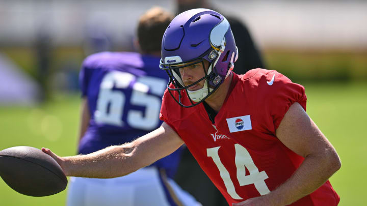 Aug 2, 2024; Eagan, MN, USA; Minnesota Vikings quarterback Sam Darnold (14) warms up during practice at Vikings training camp in Eagan, MN. Mandatory Credit: Jeffrey Becker-USA TODAY Sports