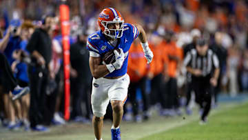 Oct 19, 2024; Gainesville, Florida, USA; Florida Gators wide receiver Chimere Dike (17) runs with the ball against the Kentucky Wildcats during the second half at Ben Hill Griffin Stadium. Mandatory Credit: Matt Pendleton-Imagn Images
