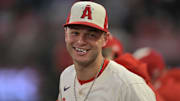 Sep 24, 2025; Anaheim, California, USA;  Los Angeles Angels catcher Logan O'Hoppe (14) in the dugout against the Kansas City Royals at Angel Stadium. Mandatory Credit: Jayne Kamin-Oncea-Imagn Images