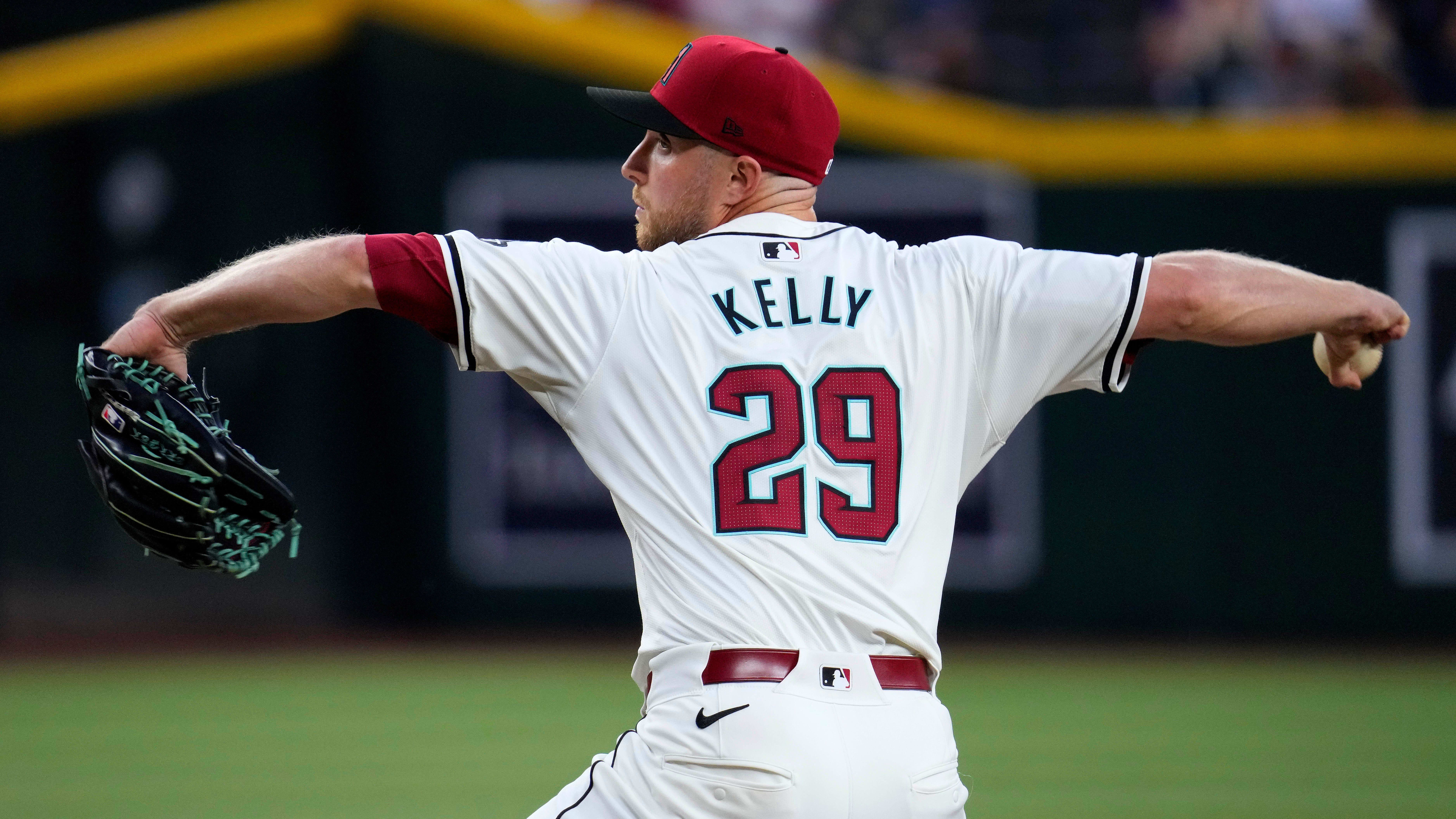 Arizona Diamondbacks right-hander Merrill Kelly (29) pitches against the Colorado Rockies at Chase Field.