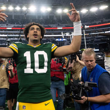Green Bay Packers quarterback Jordan Love leaves the field after beating the Dallas Cowboys in the playoffs.