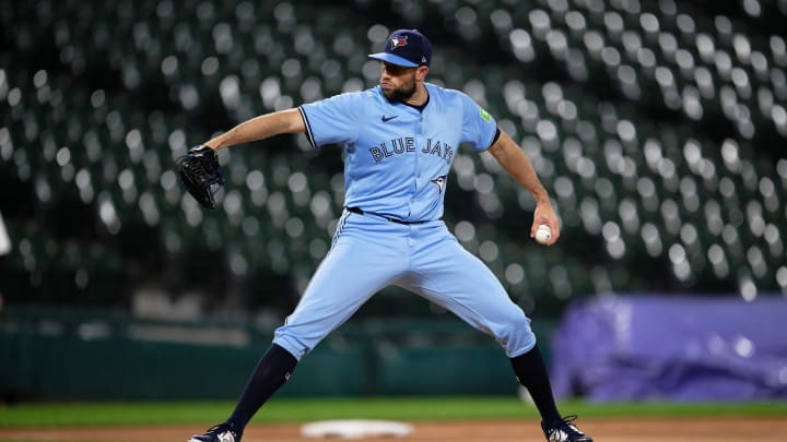 May 28, 2024; Chicago, Illinois, USA;  Toronto Blue Jays pitcher Tim Mayza (58) pitches against the Chicago White Sox at Guaranteed Rate Field. Mandatory Credit: Jamie Sabau-USA TODAY Sports