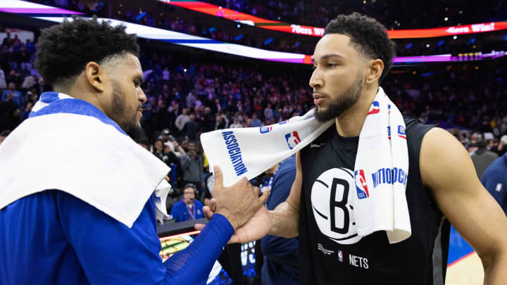 Nov 22, 2022; Philadelphia, Pennsylvania, USA; Brooklyn Nets guard Ben Simmons (R) and Philadelphia 76ers forward Tobias Harris (L) shake hands after the game at Wells Fargo Center. Mandatory Credit: Bill Streicher-USA TODAY Sports