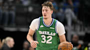Nov 12, 2025; Dallas, Texas, USA; Dallas Mavericks forward Cooper Flagg (32) brings the ball up court against the Phoenix Suns during the second quarter at the American Airlines Center. Mandatory Credit: Jerome Miron-Imagn Images