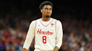 Apr 7, 2025; San Antonio, TX, USA; Houston Cougars guard Mylik Wilson (8) reacts after a play against the Florida Gators during the first half of the national championship game of the Final Four of the 2025 NCAA Tournament at the Alamodome. Mandatory Credit: Bob Donnan-Imagn Images