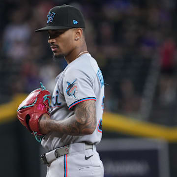 Jun 29, 2025; Phoenix, Arizona, USA; Miami Marlins pitcher Ronny Henriquez (32) pitches against the Arizona Diamondbacks during the ninth inning at Chase Field. Mandatory Credit: Joe Camporeale-Imagn Images