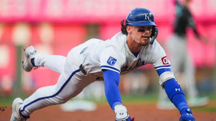 Kansas City Royals shortstop Bobby Witt Jr. (7) dives into third base for a triple.