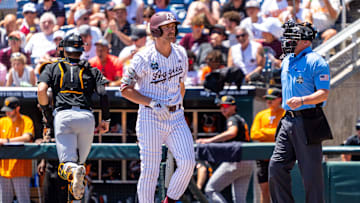 Jun 23, 2024; Omaha, NE, USA; Texas A&M Aggies designated hitter Hayden Schott (5) reacts after striking out against the Tennessee Volunteers to end the first inning at Charles Schwab Field Omaha. Mandatory Credit: Dylan Widger-USA TODAY Sports
