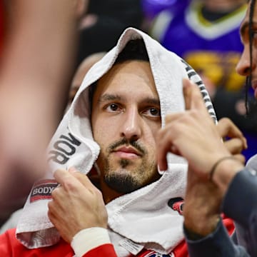 Mar 4, 2024; Salt Lake City, Utah, USA; Washington Wizards guard Landry Shamet (20) on the bench with a towel over his head against the Utah Jazz during the second half at the Delta Center. Mandatory Credit: Christopher Creveling-Imagn Images