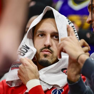 Mar 4, 2024; Salt Lake City, Utah, USA; Washington Wizards guard Landry Shamet (20) on the bench with a towel over his head against the Utah Jazz during the second half at the Delta Center. Mandatory Credit: Christopher Creveling-USA TODAY Sports