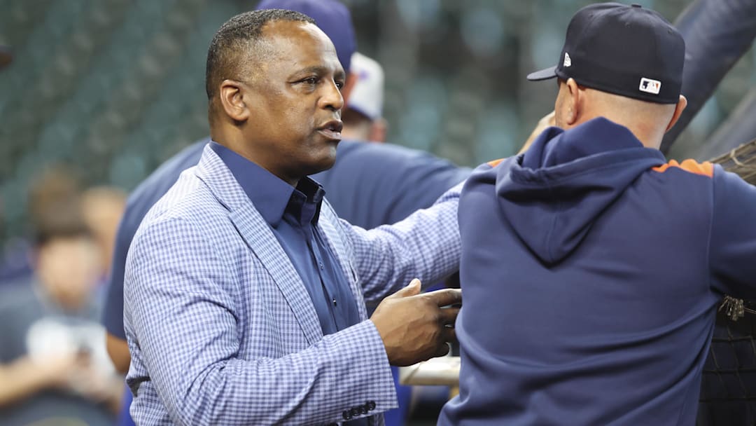 Mar 29, 2025; Houston, Texas, USA; Houston Astros general manager Dana Brown talks on the field before the game against the New York Mets at Daikin Park. 