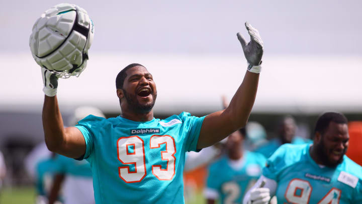 Miami Dolphins defensive tackle Calais Campbell (93) reacts toward the fans during training camp at Baptist Health Training Complex.