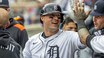 Apr 26, 2025; Detroit, Michigan, USA; Detroit Tigers first base Spencer Torkelson (20) celebrates with teammates in the dugout after hitting a solo home run against Baltimore Orioles pitcher Matt Bowman (51) in the seventh inning during game one of a double header at Comerica Park.