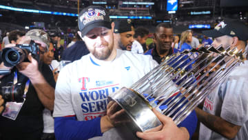 South Carolina baseball alum Jordan Montgomery with the World Series trophy after winning the title this year with the Texas Rangers