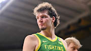 Feb 19, 2025; Iowa City, Iowa, USA; Oregon Ducks center Nate Bittle (32) walks off the court after the game against the Iowa Hawkeyes at Carver-Hawkeye Arena. Mandatory Credit: Jeffrey Becker-Imagn Images