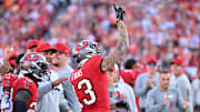 Jan 5, 2025; Tampa, Florida, USA; Tampa Bay Buccaneers wide receiver Mike Evans (13) celebrates after a reception to put him over 1,000 yards for the season in the second half against the New Orleans Saints at Raymond James Stadium. Mandatory Credit: Jonathan Dyer-Imagn Images