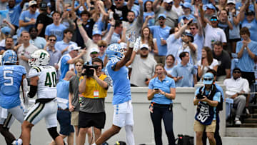Sep 7, 2024; Chapel Hill, North Carolina, USA; North Carolina Tar Heels tight end Bryson Nesbit (18) reacts after scoring a touchdown in the 1st quarter at Kenan Memorial Stadium. Mandatory Credit: Bob Donnan-Imagn Images