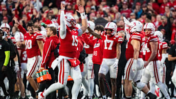 Nov 23, 2024; Lincoln, Nebraska, USA; Nebraska Cornhuskers quarterback Dylan Raiola (15) hypes up the crowd at the end of the third quarter against the Wisconsin Badgers at Memorial Stadium. Mandatory Credit: Dylan Widger-Imagn Images