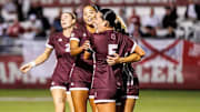 Mississippi State Centerfielder Zoe Main (#7), Mississippi State Forward Kyra Taylor (#3) and Mississippi State Midfielder Ally Perry (#5) during the match between the Alabama Crimson Tide and the Mississippi State Bulldogs at the Alabama Soccer Stadium in Tuscaloosa, AL.