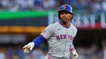 Jun 2, 2025; Los Angeles, California, USA; New York Mets shortstop Francisco Lindor (12) rounds the bases during the first inning against the Los Angeles Dodgers during the first inning against the New York Mets at Dodger Stadium. Mandatory Credit: Jason Parkhurst-Imagn Images