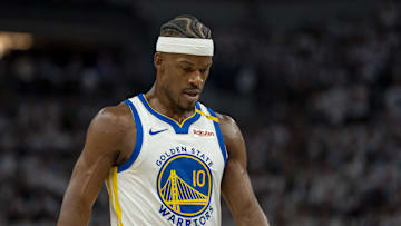 Golden State Warriors forward Jimmy Butler III looks on against the Minnesota Timberwolves during the 2025 NBA Playoffs.