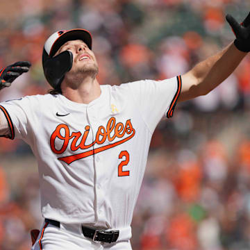 Sep 2, 2024; Baltimore, Maryland, USA; Baltimore Orioles shortstop Gunnar Henderson (2) reacts after crossing home plate following a first inning solo home run against the Chicago White Sox at Oriole Park at Camden Yards