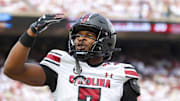 Oct 19, 2024; Norman, Oklahoma, USA;  South Carolina Gamecocks defensive back Nick Emmanwori (7) reacts after returning an interception for a touchdown during the first half against the Oklahoma Sooners at Gaylord Family-Oklahoma Memorial Stadium. Mandatory Credit: Kevin Jairaj-Imagn Images